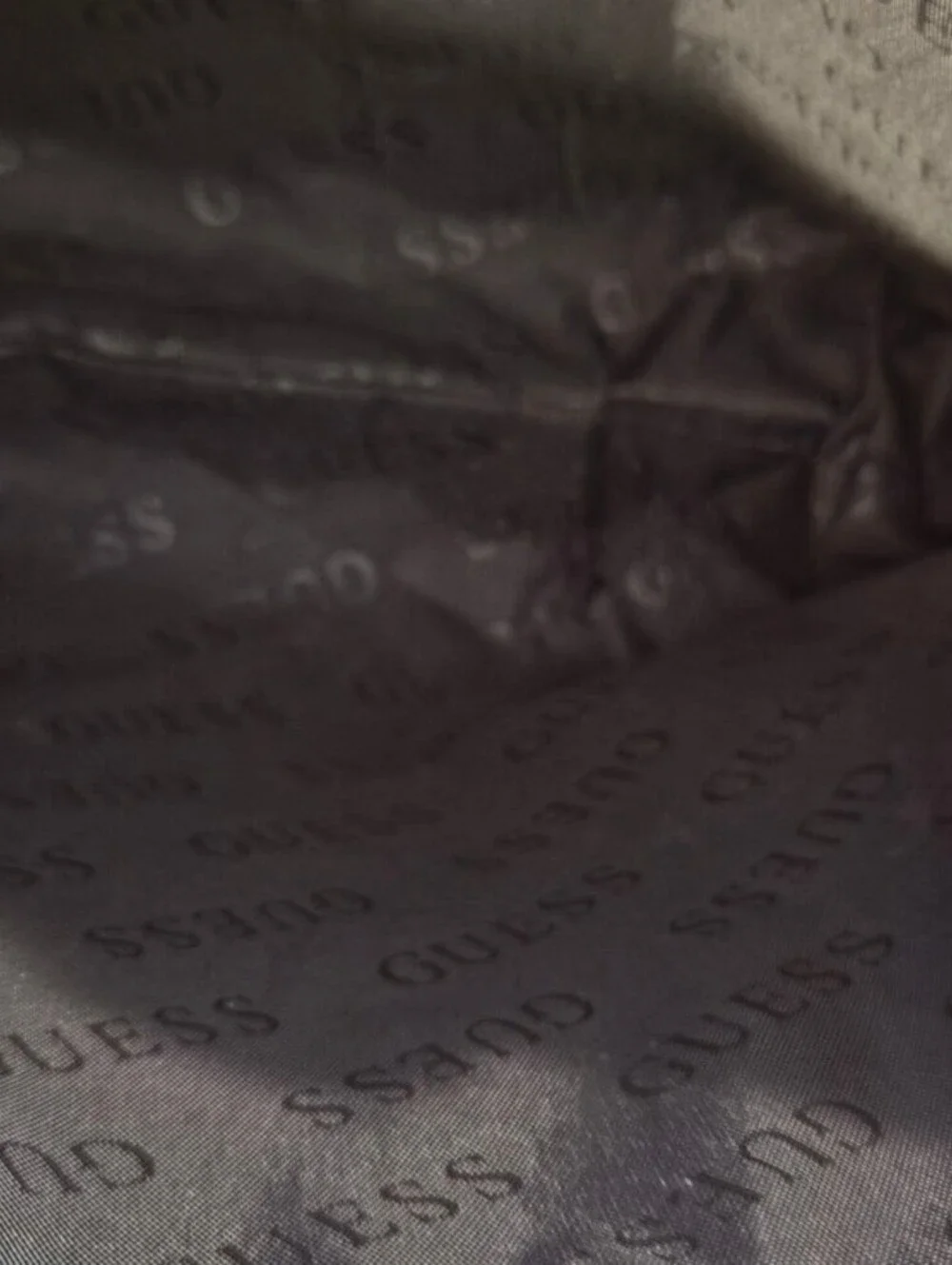 Guess Silver Embossed Logo Cosmetic Bag